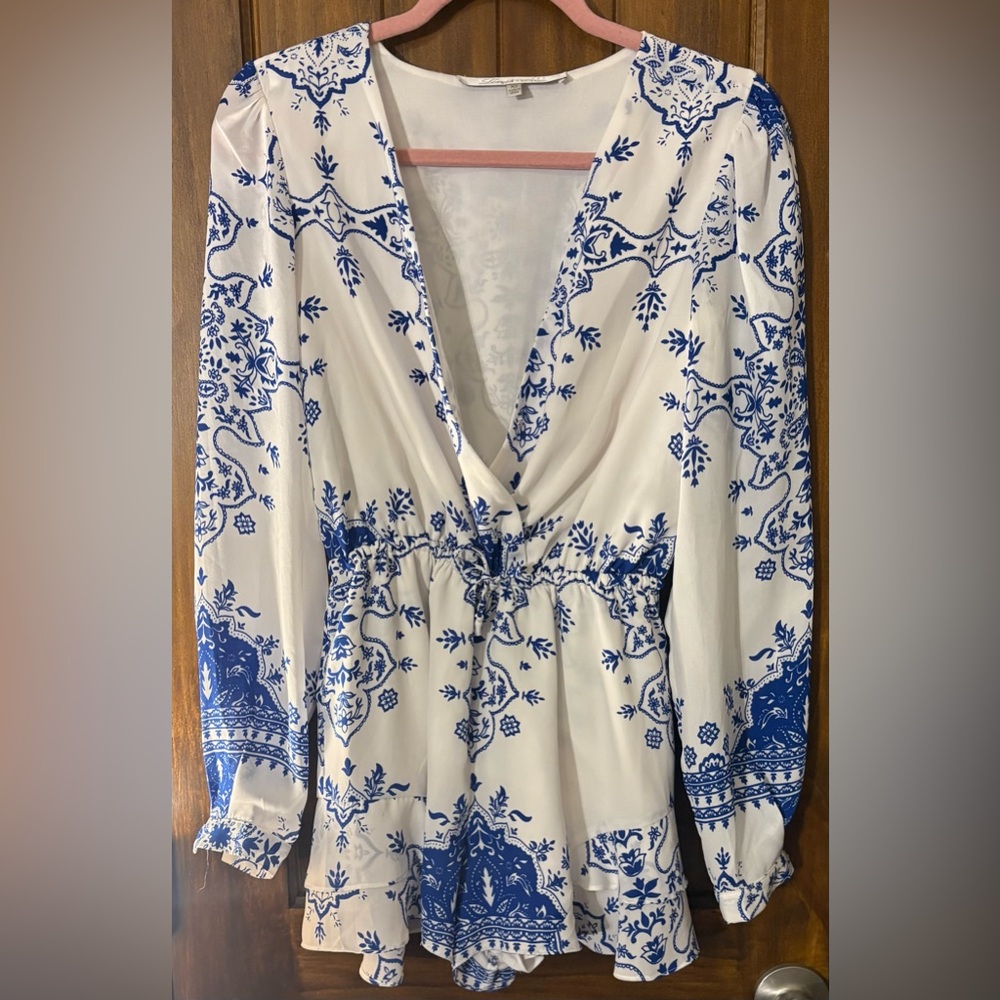 Lovers + friends Blue and White Floral Long Sleeve romper
